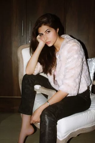 Model Elnaaz Norouzi Actress Sitting Chair White Top