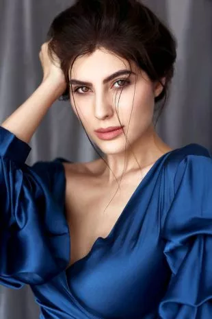 Model Elnaaz Norouzi Blue Top Photoshoot